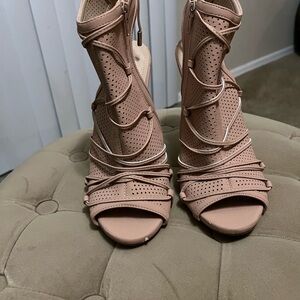 Strappy Heels
-***Worn twice. No box***
tiny nicks on the shoe. See pics